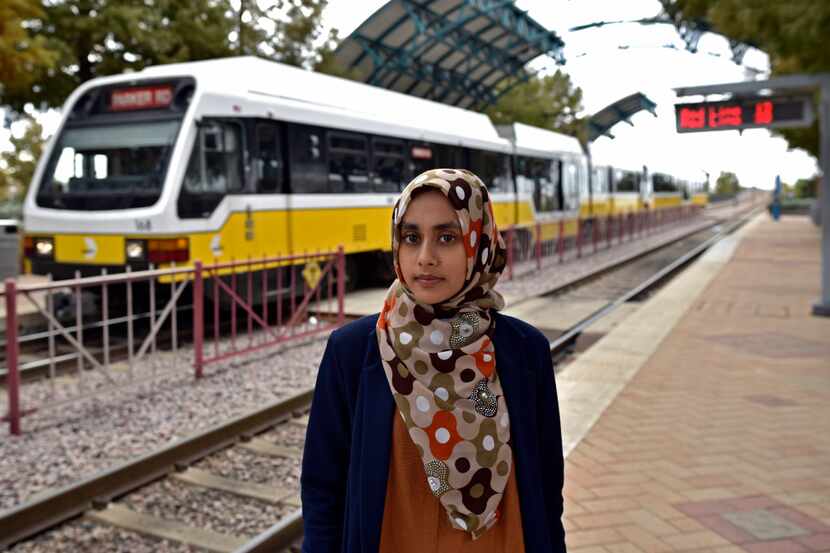 Aysha Khan, 21, a Muslim woman who rides the DART from Arapaho Center Station to the...