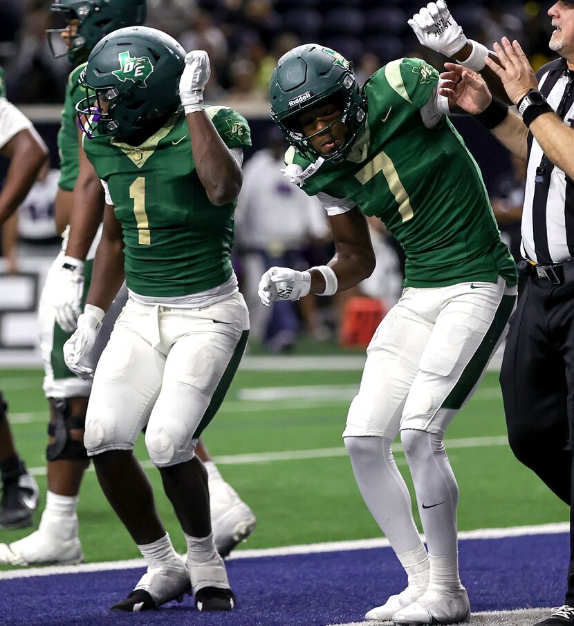 DeSoto running back Deondrae Riden Jr (1) and wide receiver Ethan Feaster (7) celebrate...