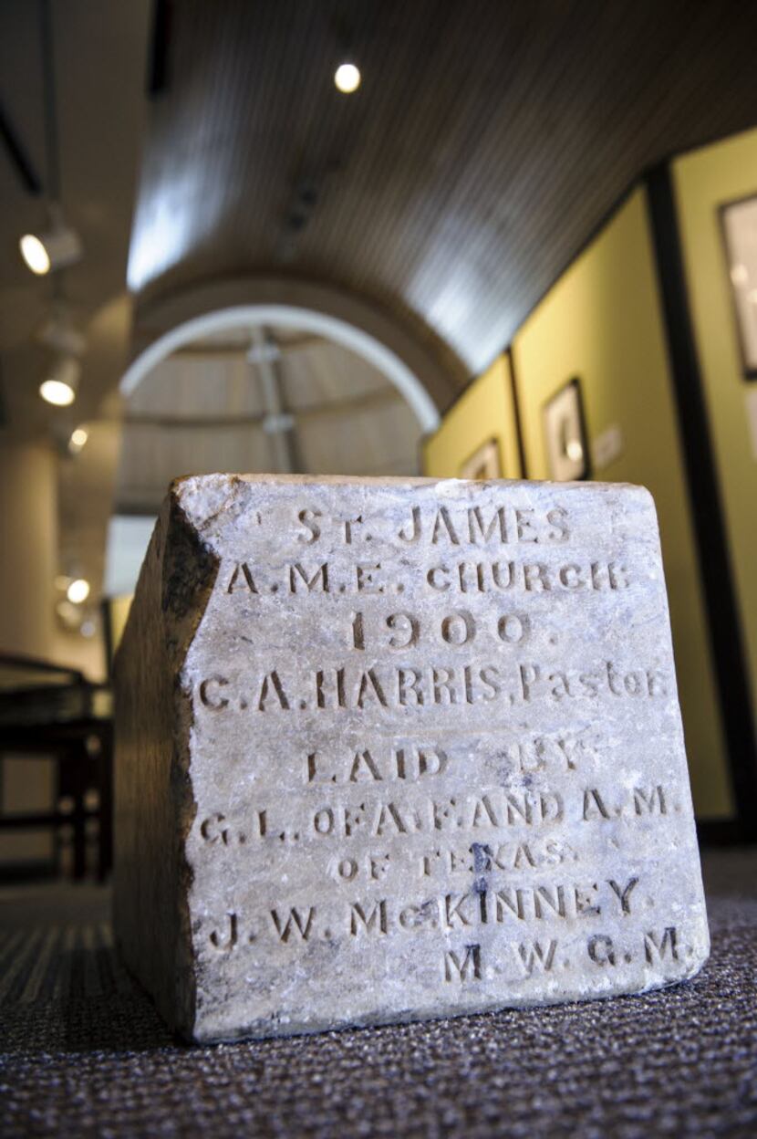 A headstone from Freedman's Cemetery is on display in the exhibit "Facing the Rising Sun:...