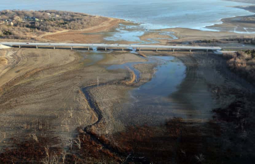 Lake Lavon, photographed during a period of drought that left it only about half full, is...