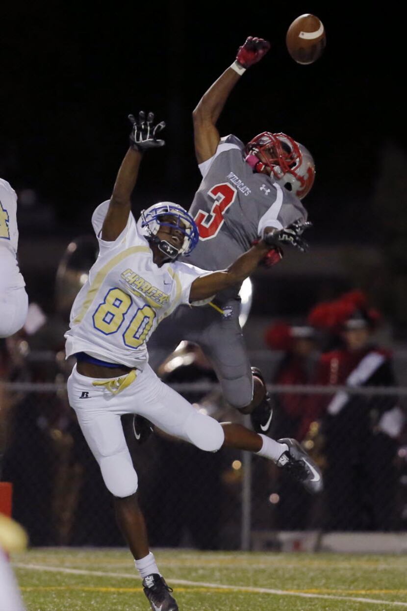 TXHSFB Woodrow Wilson junior wide receiver Justin Cain (3) is unable to catch a pass in the...