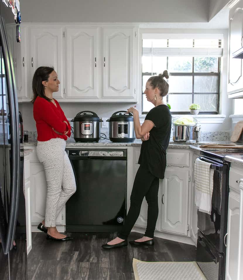 Tamara Abuomar and author Rebecca White chat while cooking in Tamara's Plano home.