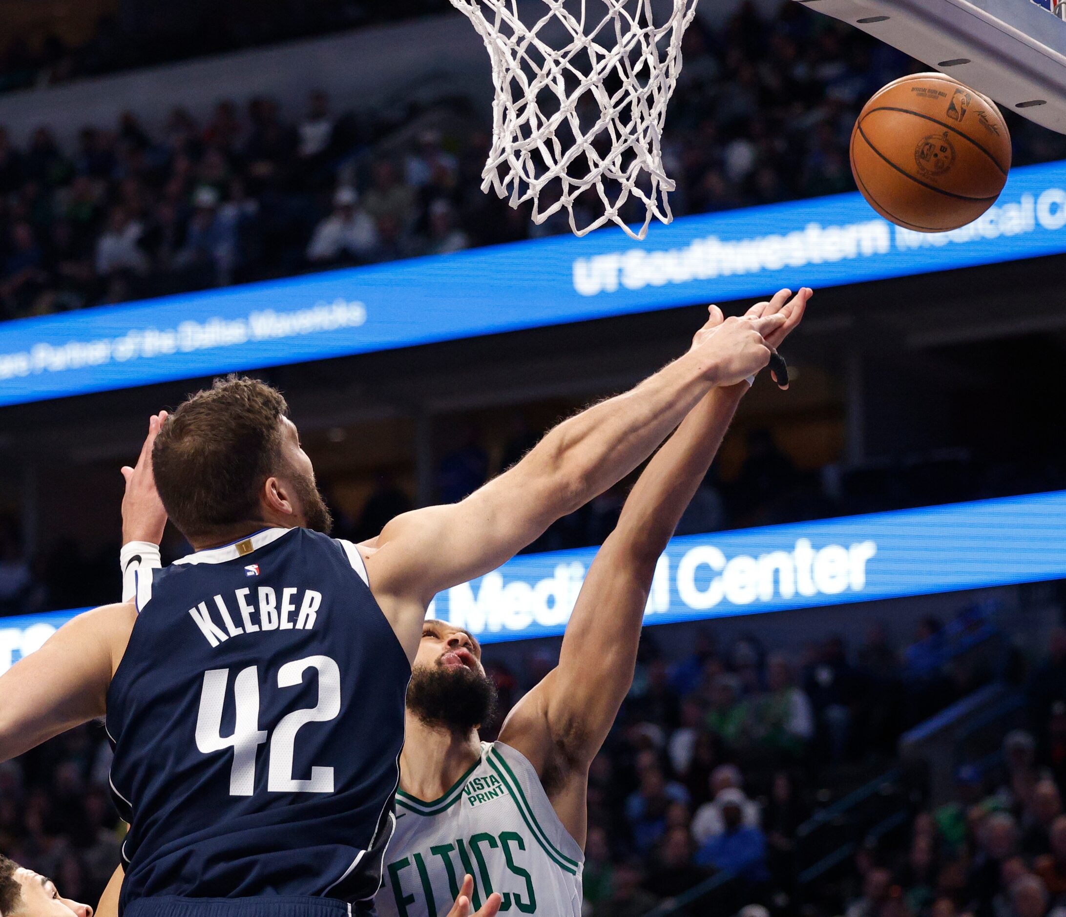 Dallas Mavericks forward Maxi Kleber (42) blocks a shot from Boston Celtics guard Derrick...