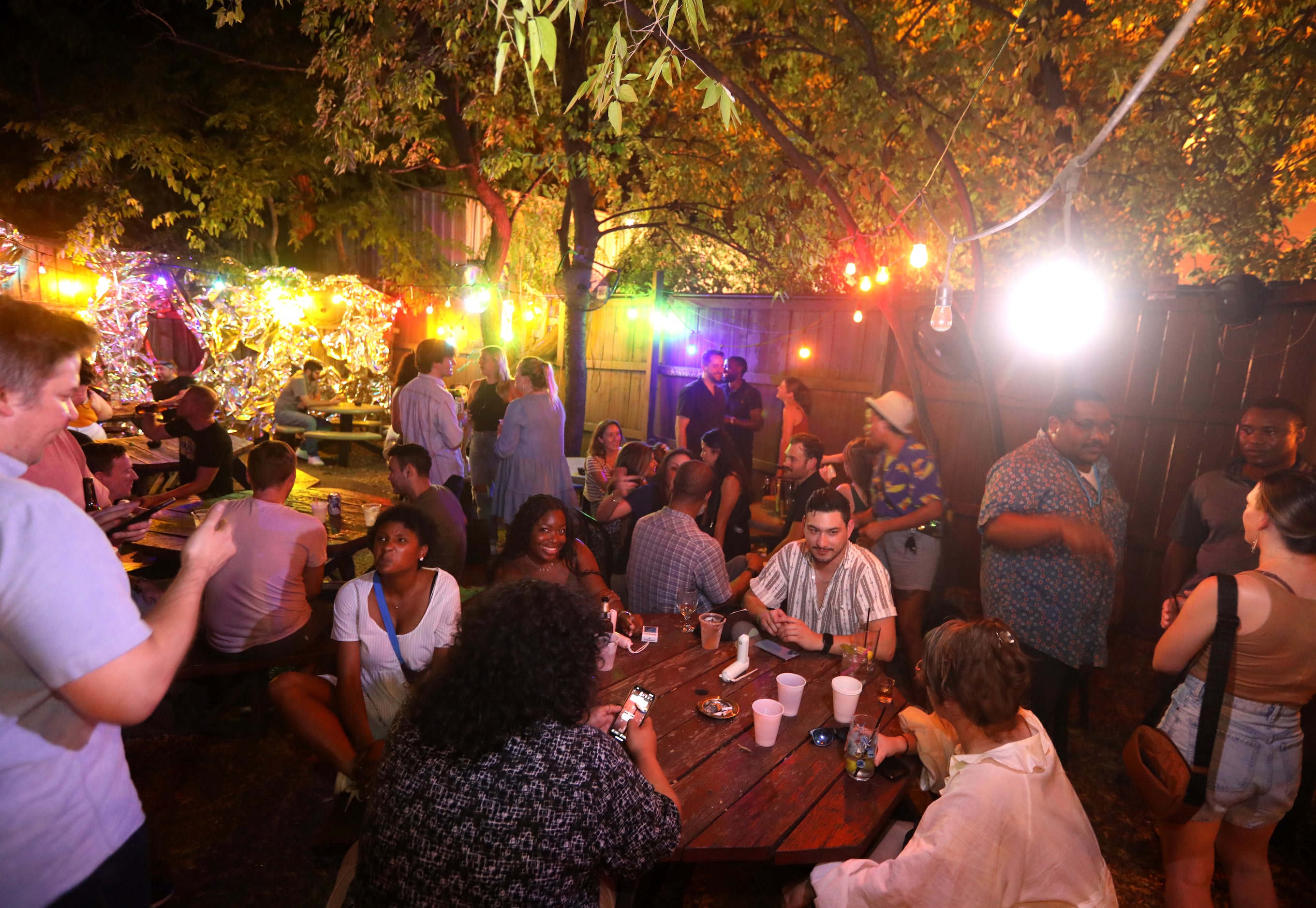 Guests enjoy one last evening at the Grapevine Bar in Dallas, TX, on Aug 23, 2023.  (Jason...