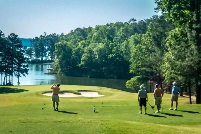 
Many of Reynolds Plantation’s 117 holes play along the Oconee River, such as this hole on...
