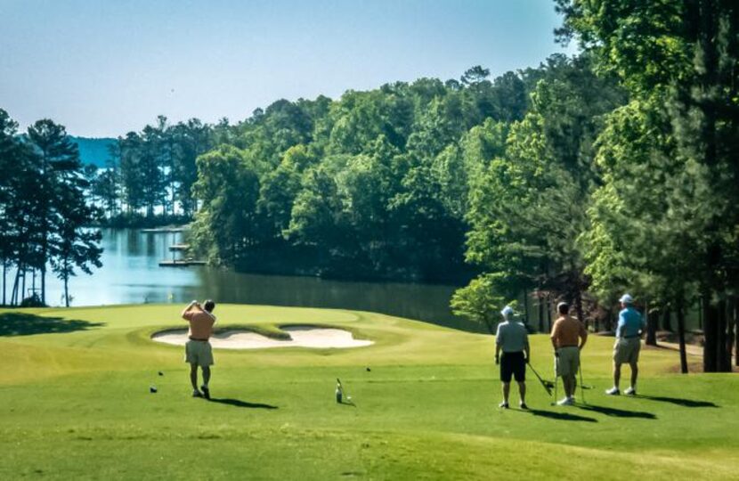 
Many of Reynolds Plantation’s 117 holes play along the Oconee River, such as this hole on...