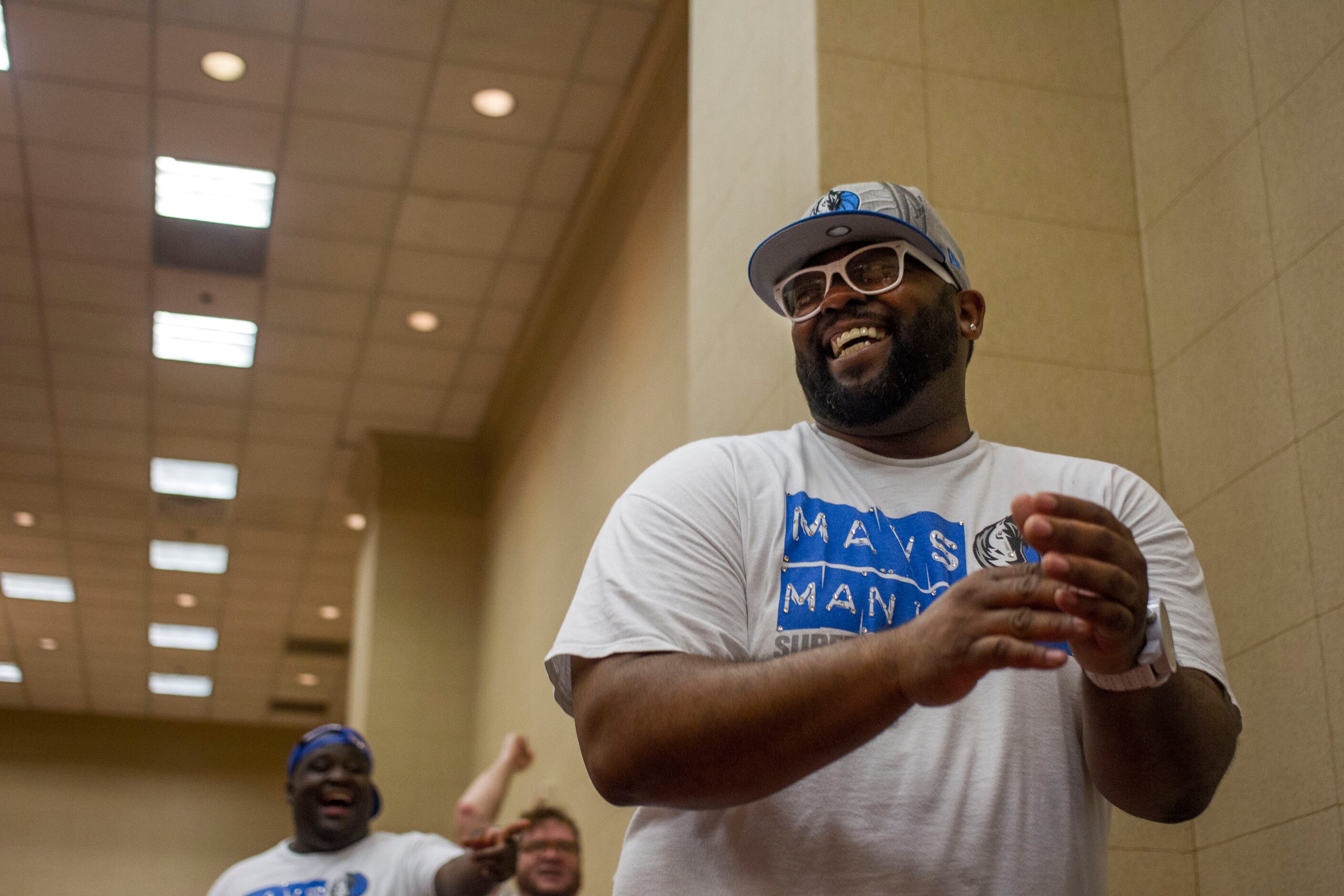 1 Love, team member of The Mavs ManiAACs for eight years, laughs during tryouts for the...