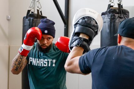 Former Dallas Mavericks player Deron Williams (left) trains with head coach Sayif Said at...