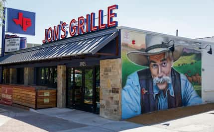 A large mural of actor Sam Elliott is on the side of Jon’s Grille in Fort Worth. During the...