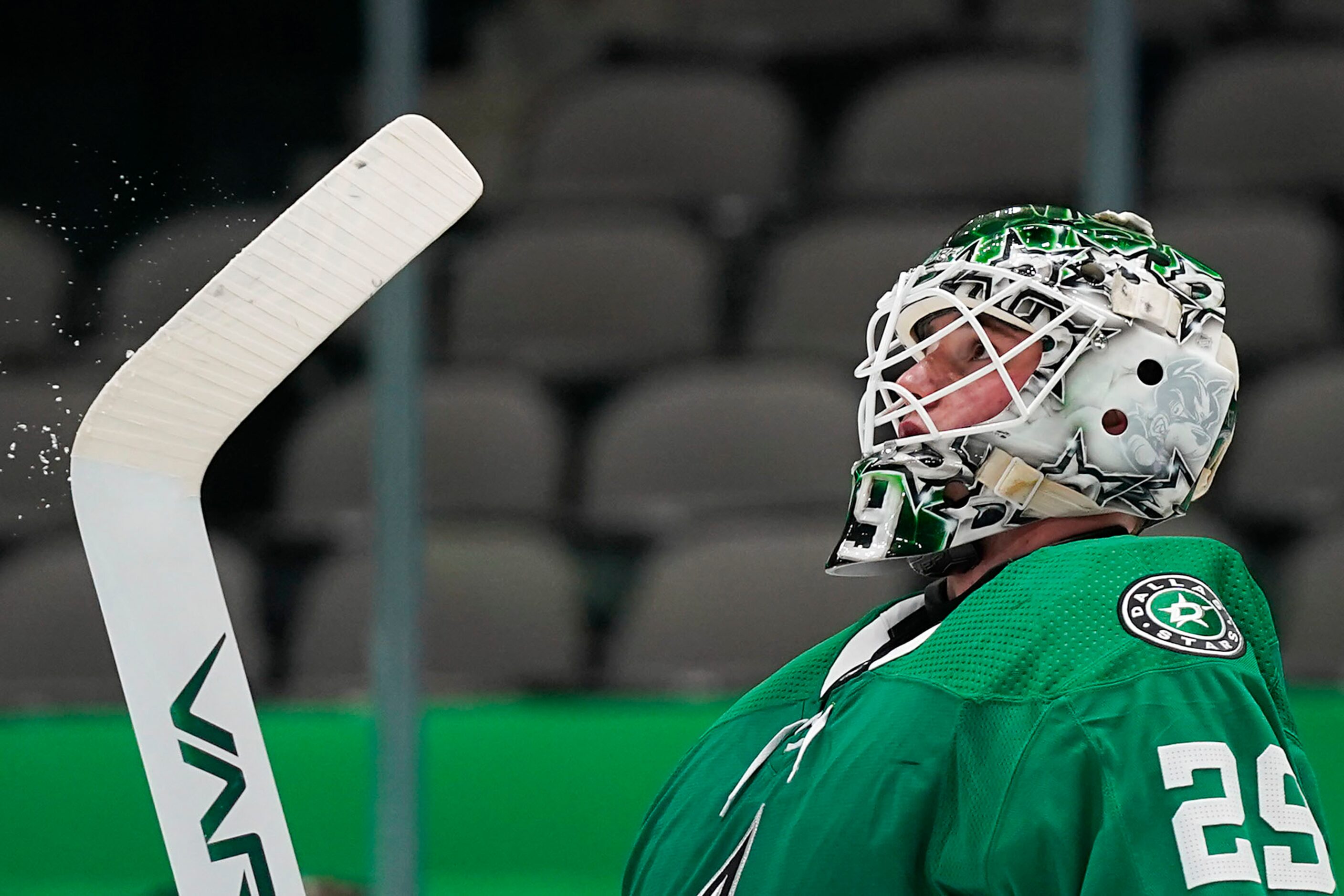 Dallas Stars goaltender Jake Oettinger reacts after giving up a Tampa Bay Lightning goal...