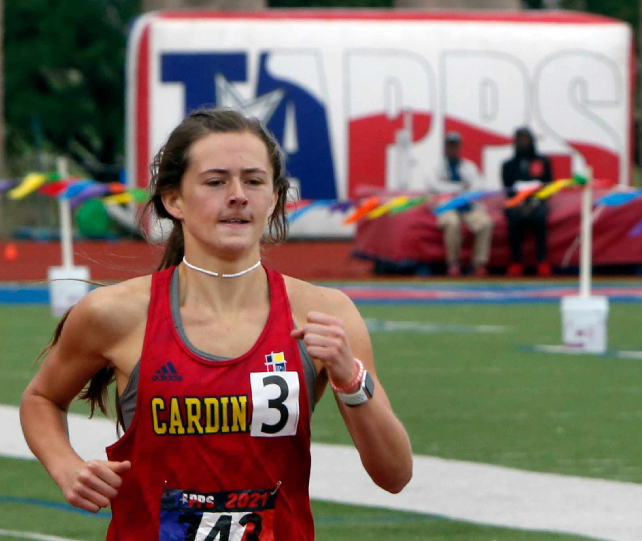 John Paul ll's Lanie Meeks drives toward a second place finish in the Class 6A Women 800...