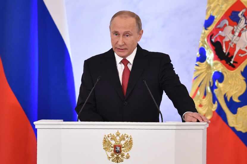 This file photo taken on December 1, 2016 shows Russian President Vladimir Putin addressing...