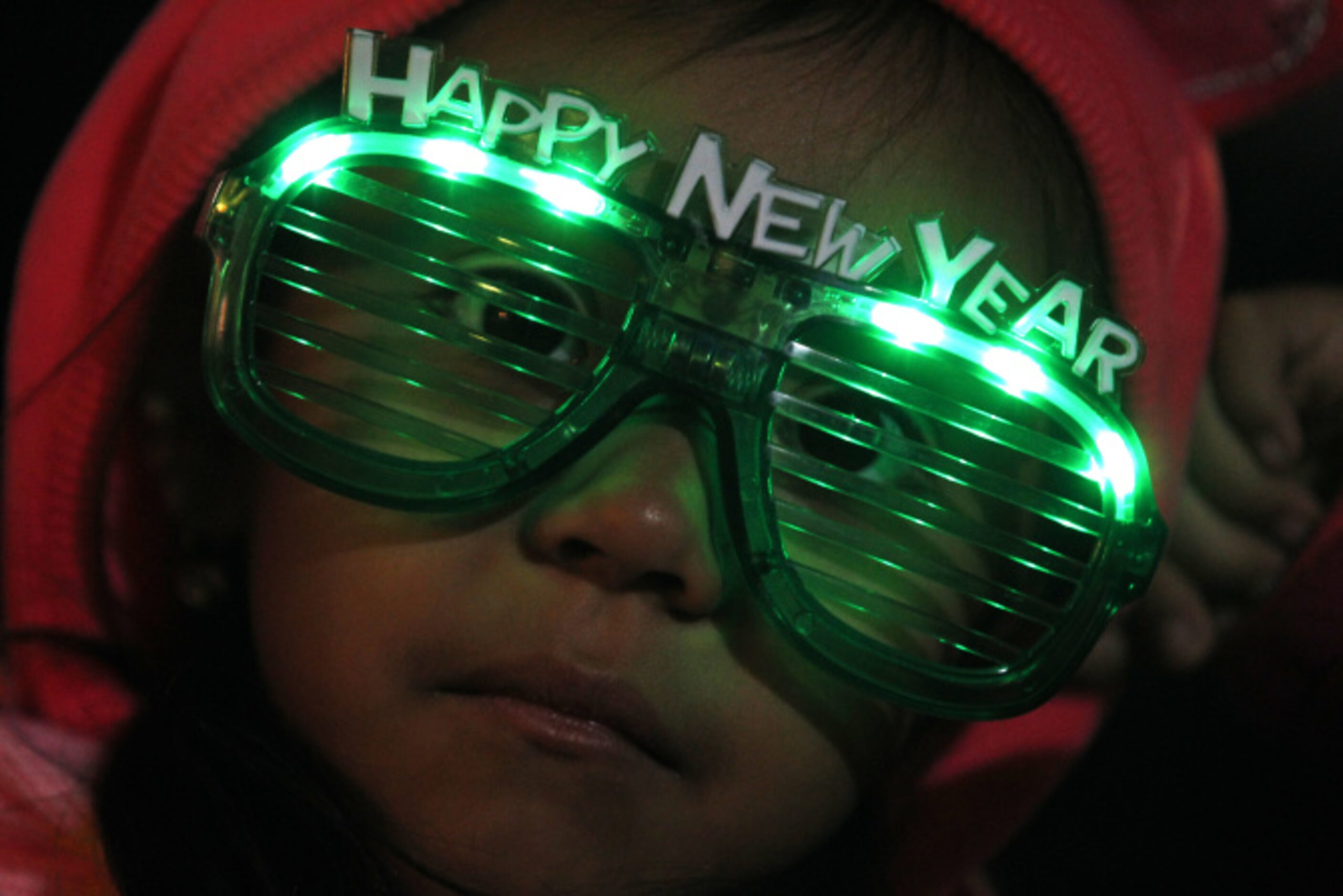 Yalixza Melgar, 5, with her new years glasses at Big D New Years Eve celebration at American...