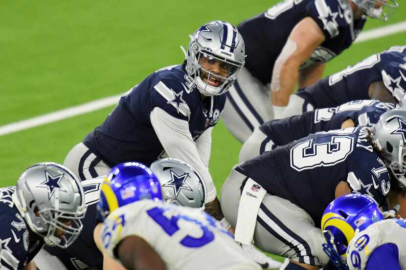 Dak Prescott #4 of the Dallas Cowboys stands under center during the second half against the...