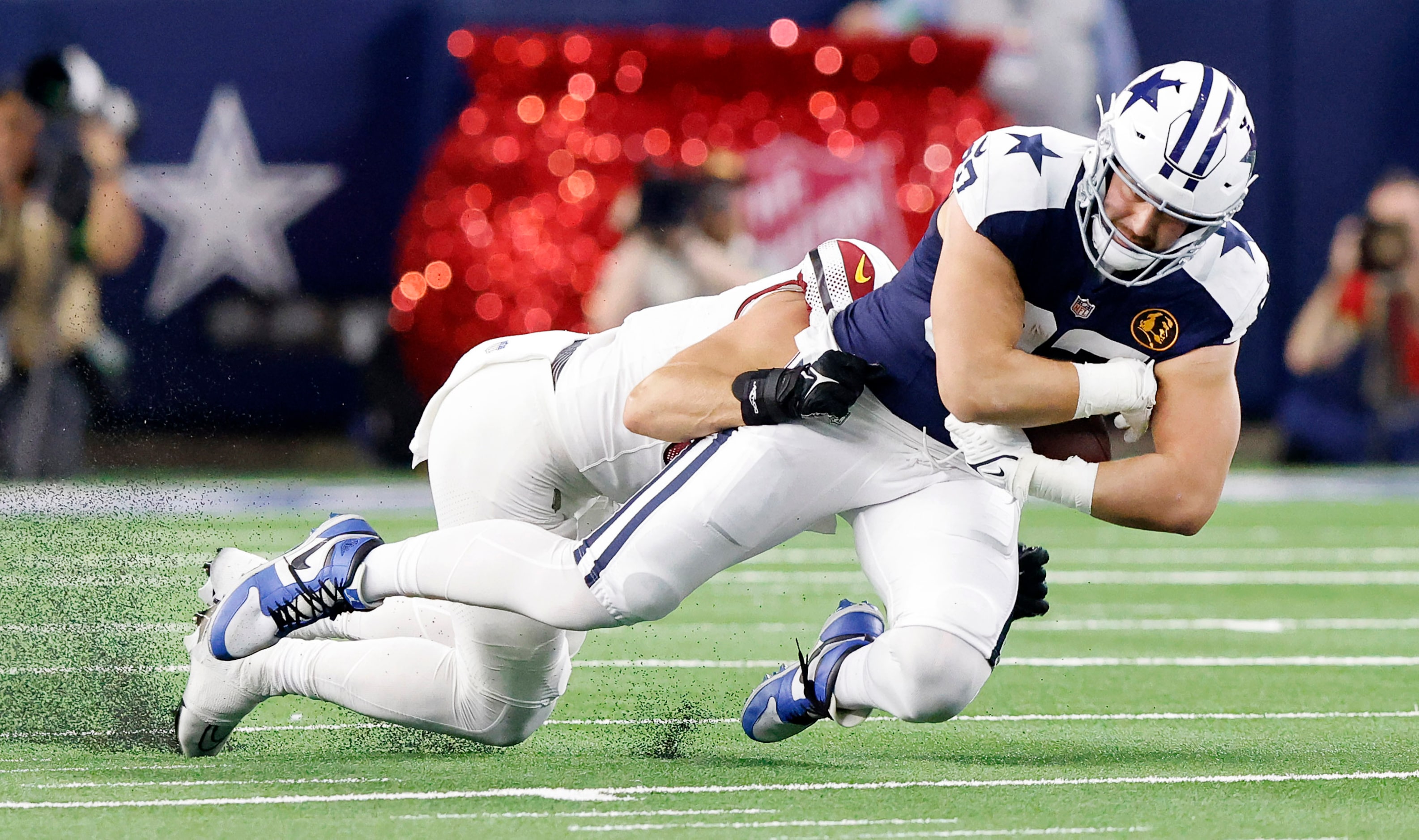 Dallas Cowboys tight end Jake Ferguson (87) catches a long pass down the middle as he’s...