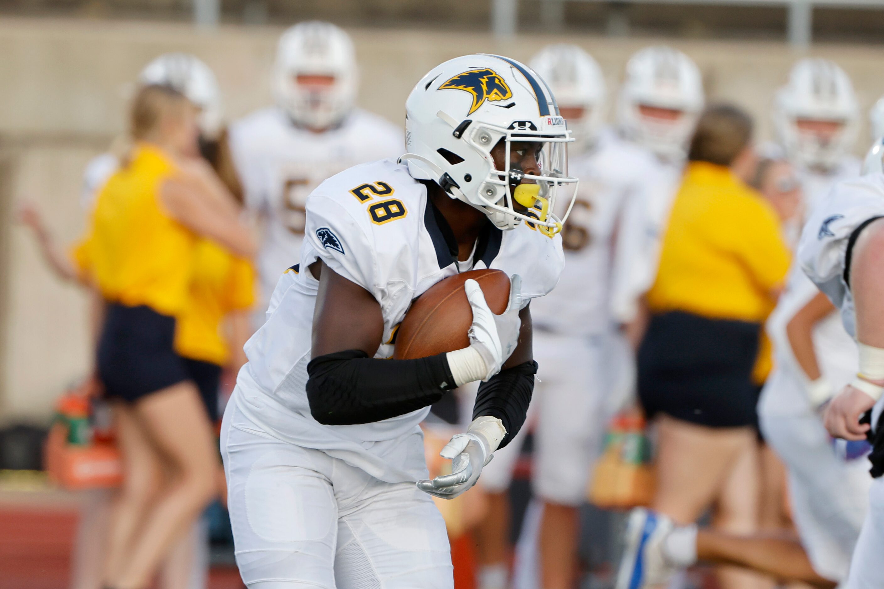 Prestonwood Christian Academy running back Tarris Murray (28) runs against Coppell during a...