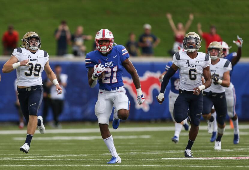 FILE - SMU wide receiver Reggie Roberson Jr. (21) makes a break for a touchdown during a...