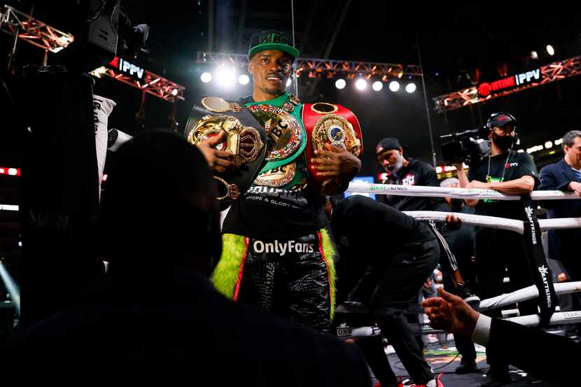 DeSoto’s Errol Spence Jr. (28-0) celebrates beating Yordenis Ugas (27-4), via a technical...