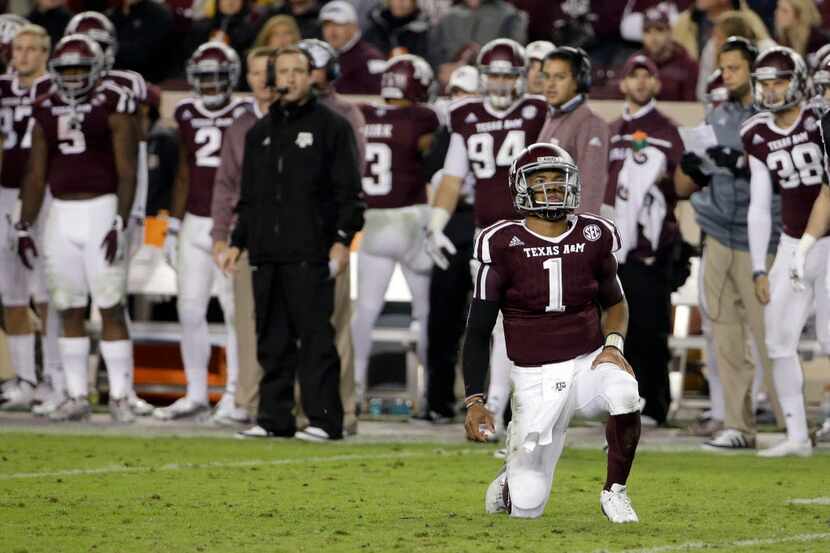 Texas A&M quarterback Kyler Murray (1) is slow to get up after being hit during the second...
