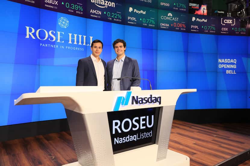 Albert G. Hill IV (at podium, right) and his business partner, Juan Jose Rosas (at podium,...
