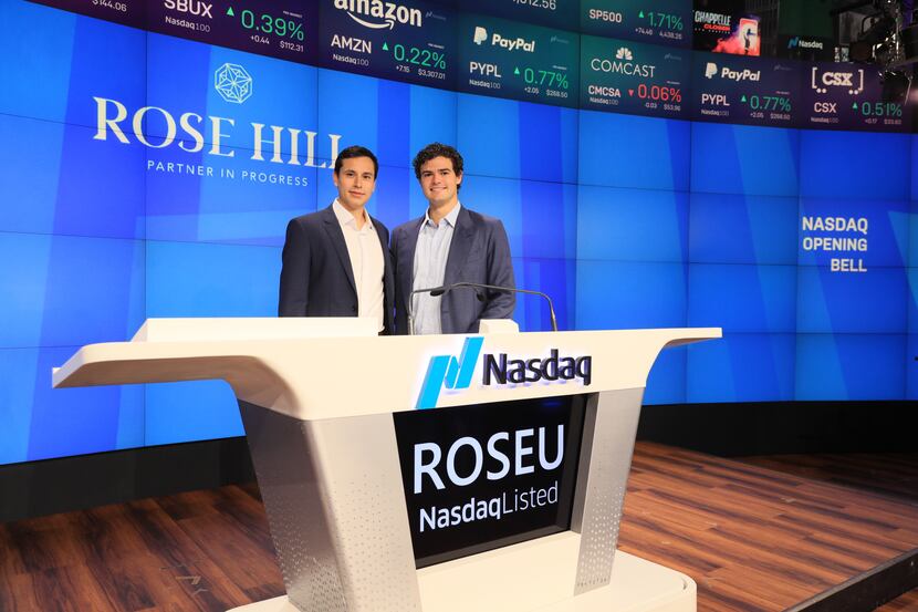 Albert G. Hill IV (at podium, right) and his business partner, Juan Jose Rosas (at podium,...