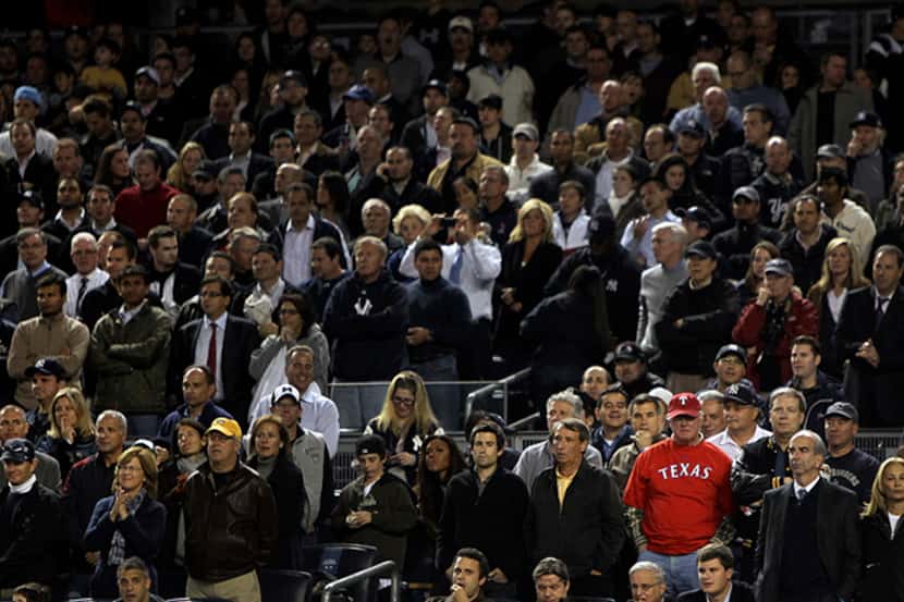  October 20, 2010--A lone Texas Rangers fans stands out in the crowd of Yankees fans in the...
