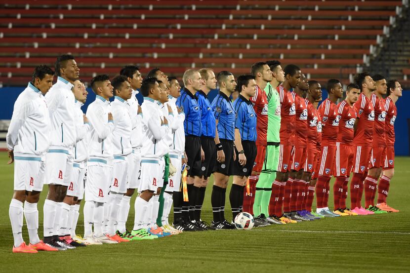 Alianza FC, left, and FC Dallas, line up prior to their preseason game at Toyota Stadium in...