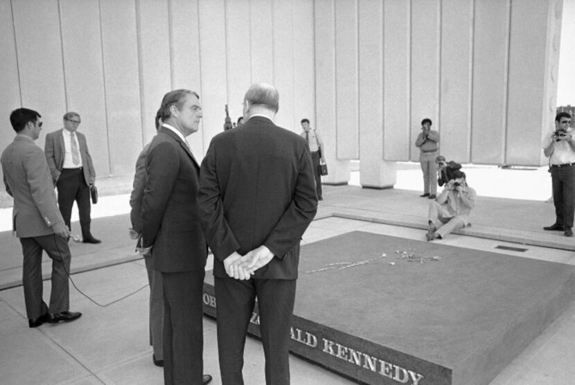 Sargent Shriver, brother-in-law of Kennedys, left, chats with Dallas Mayor Erik Jonsson,...