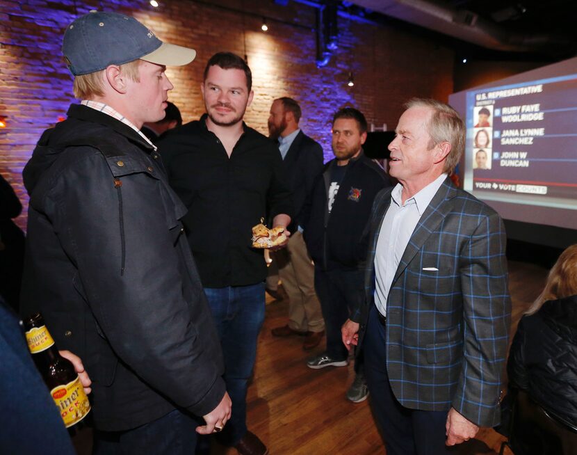 Texas Senate District 8 primary candidate Phillips Huffines, right, greets his nephew Devin...