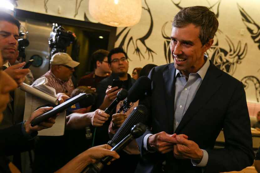Presidential candidate Beto O'Rourke speaks with members of the media following a round...