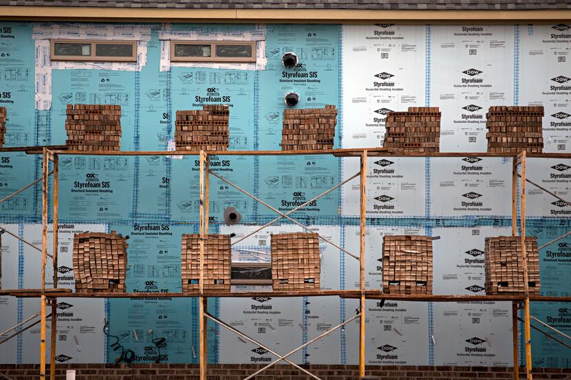 Bricks await use as facade on new construction in the Richwoods community in Frisco.