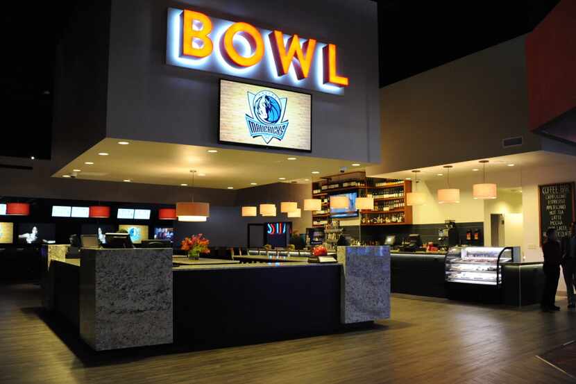 The bowling alley features both a coffee bar and a traditional bar.