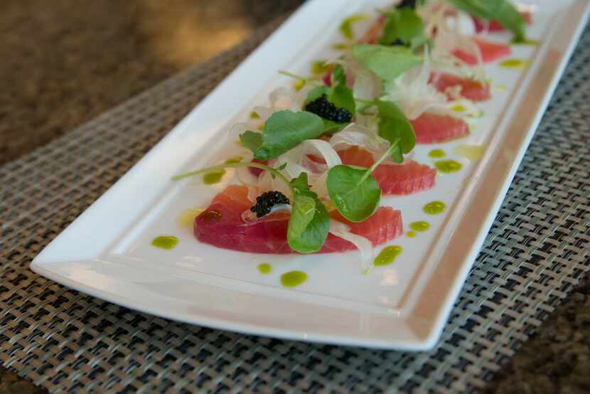 Red beet-cured salmon with shaved fennel, watercress and caviar