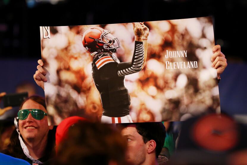 NEW YORK, NY - MAY 08:  Fans hold up a sign reading "Johnny Cleveland" as Johnny Manziel of...