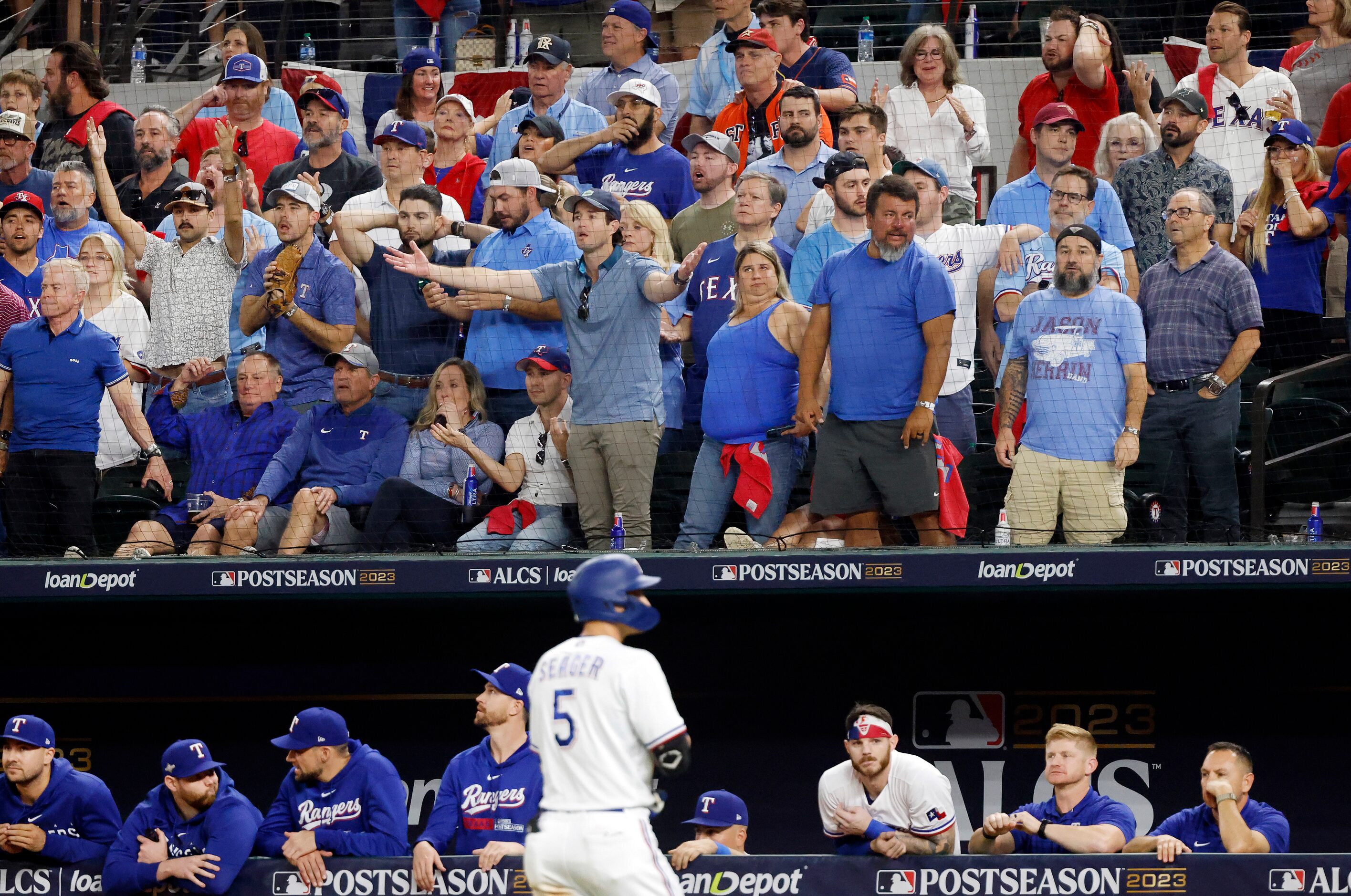 Texas Rangers fans are beside themselves as Corey Seager flied out to center during the...