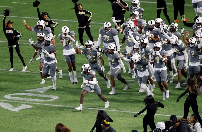 The South Oak Cliff football team takes the field to face Melissa in the Class 5A Division...