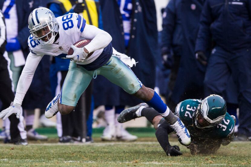 Dallas Cowboys wide receiver Dez Bryant (88) is tackled by Philadelphia Eagles cornerback...