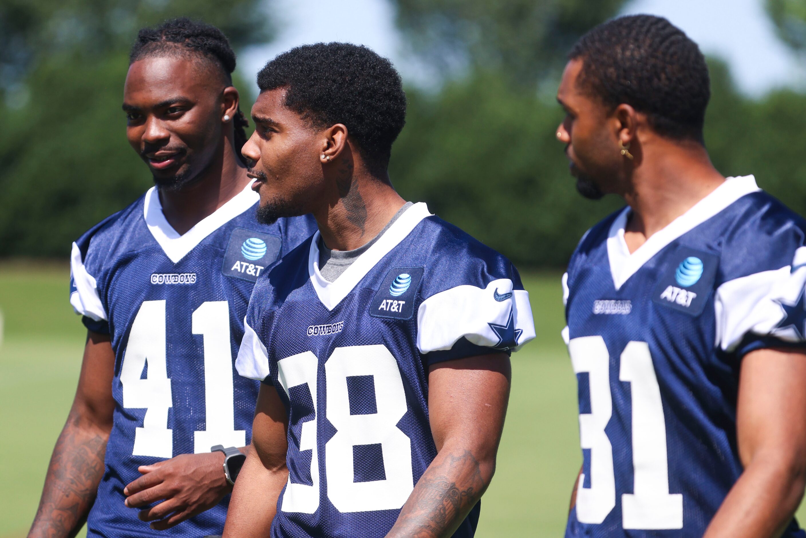 Dallas Cowboys defensive backs Josh DeBerry (center),  Caelen Carson (left), and Josh Butler...