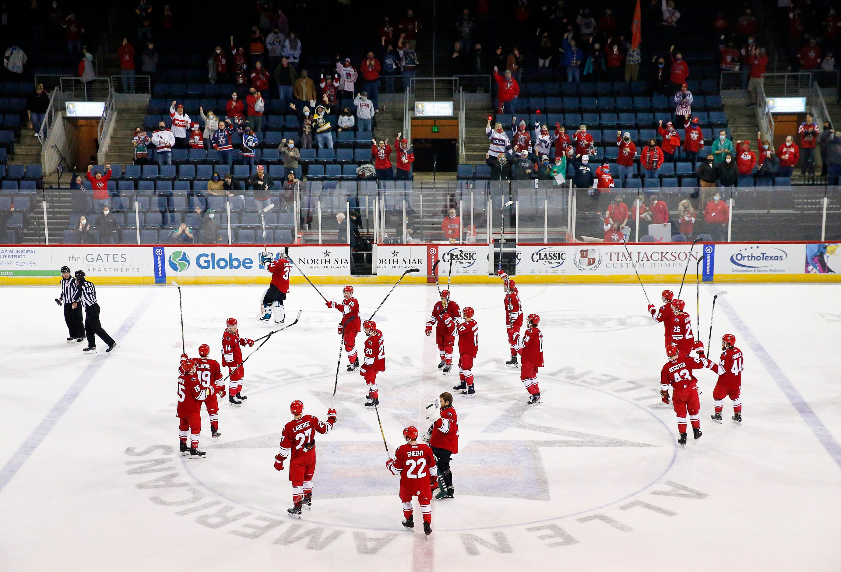 The Allen Americans hockey team celebrates their, 5-2, win over the Rapid City Rush at the...