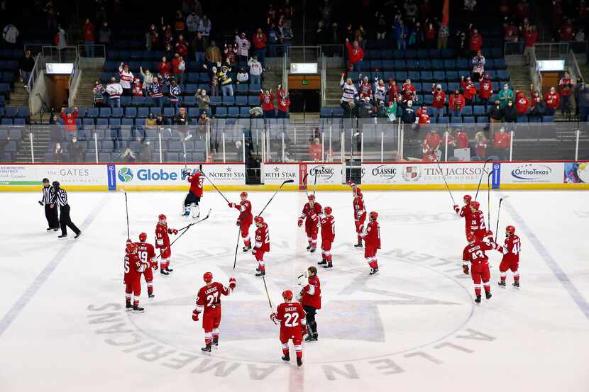 The Allen Americans hockey team celebrates their, 5-2, win over the Rapid City Rush at the...
