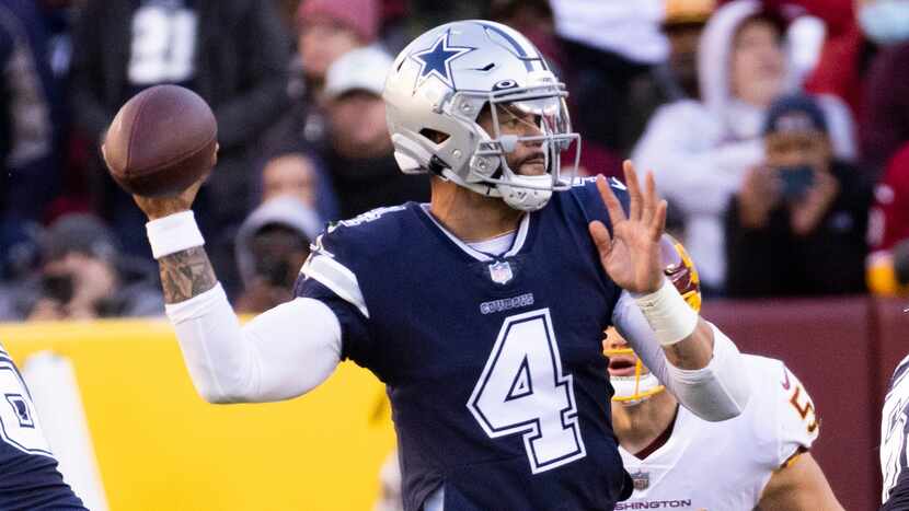 Dallas Cowboys quarterback Dak Prescott prepares to pass during the third quarter against...