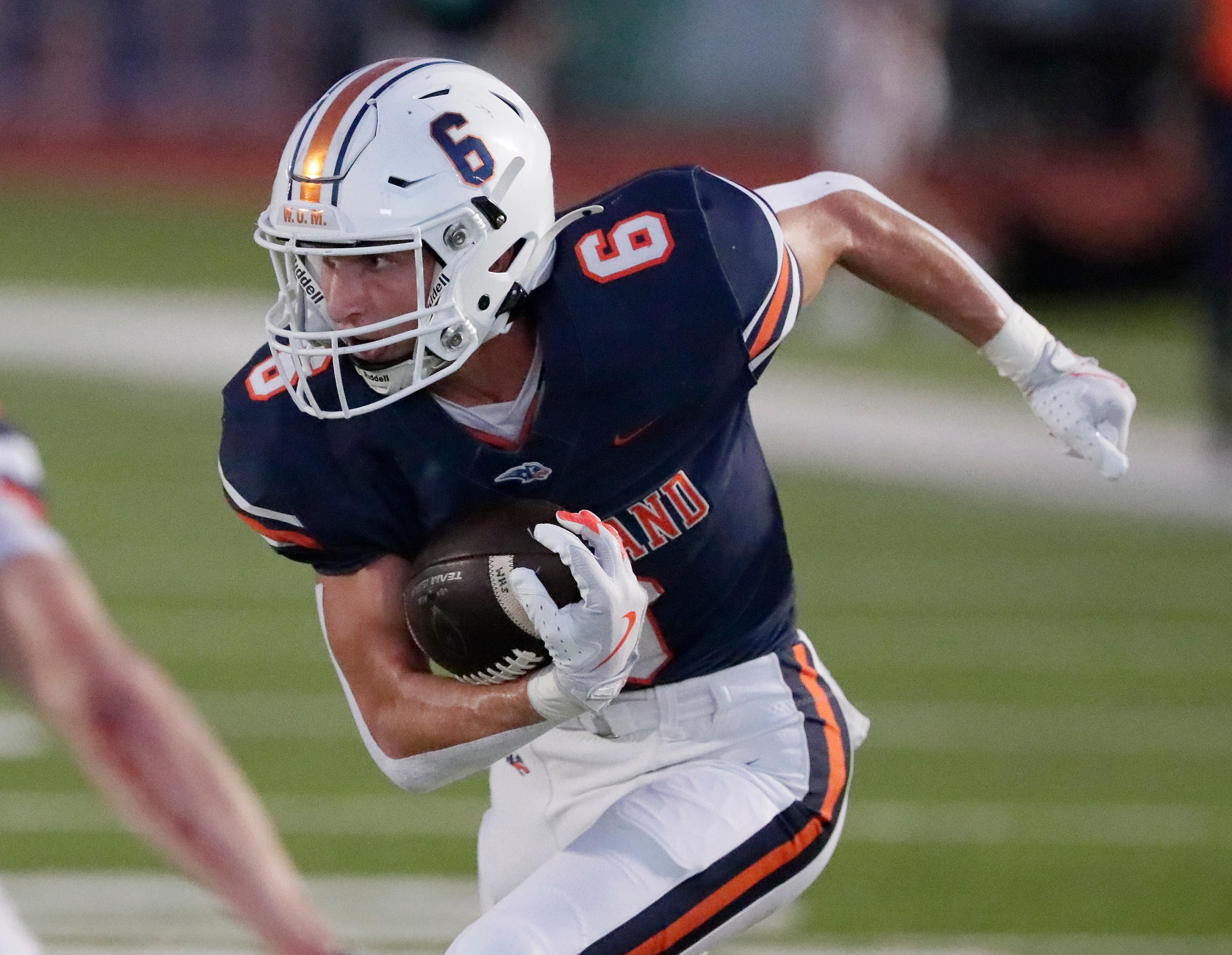 Wakeland High School wide receiver Grayson Myer (6) makes a run after the catch during the...