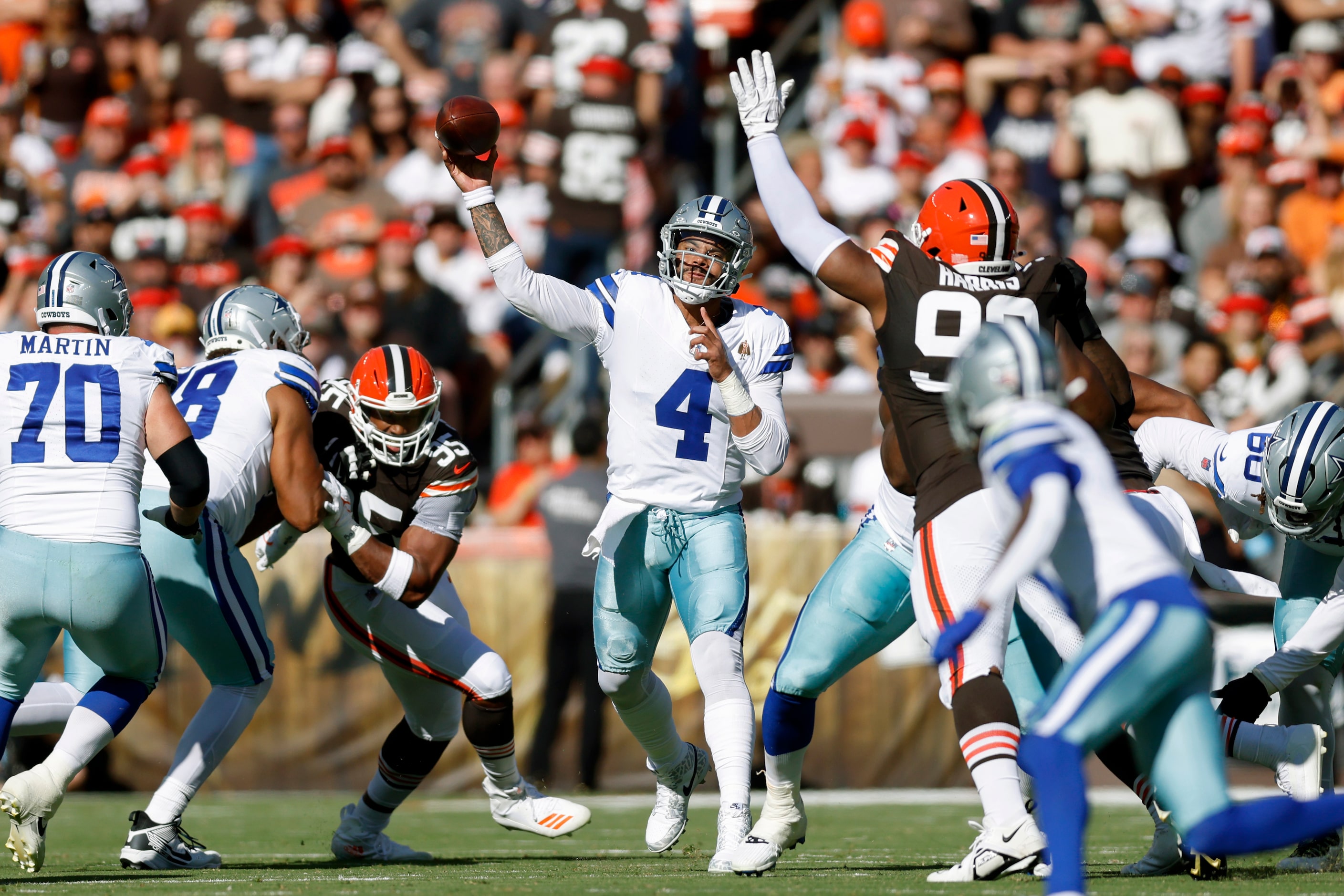 Dallas Cowboys quarterback Dak Prescott (4) throws a pass over the middle during the first...