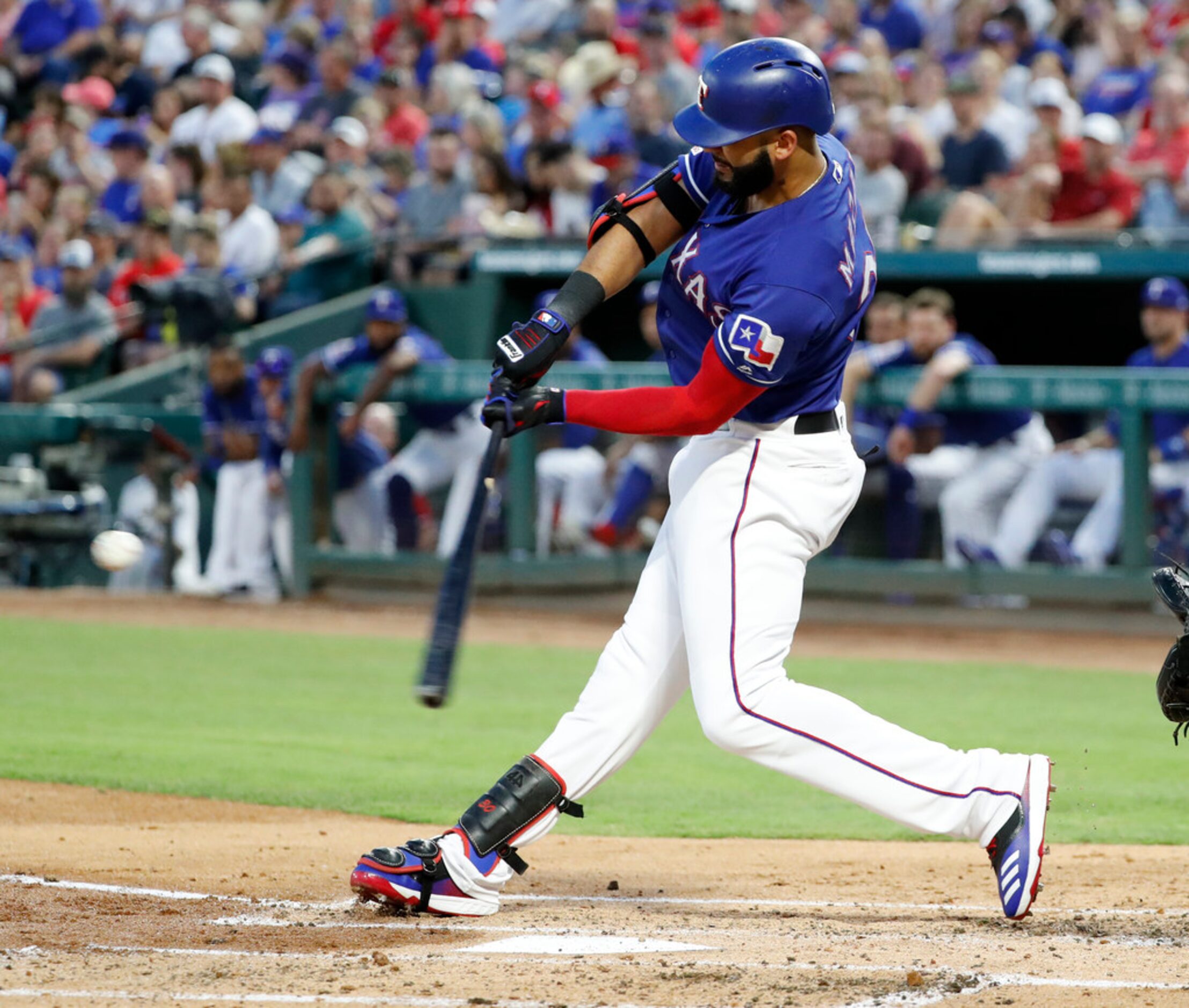 Texas Rangers' Nomar Mazar connects for a two-run home run against he Chicago White Sox in...