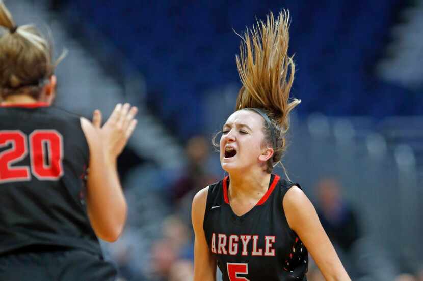 Argyle's Rhyle McKinney celebrates during a state semifinal against Houston Wheatley in...