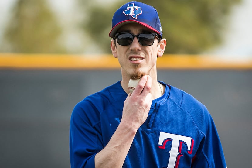 Texas Rangers pitcher Tim Lincecum works out at the team's spring training facility on...
