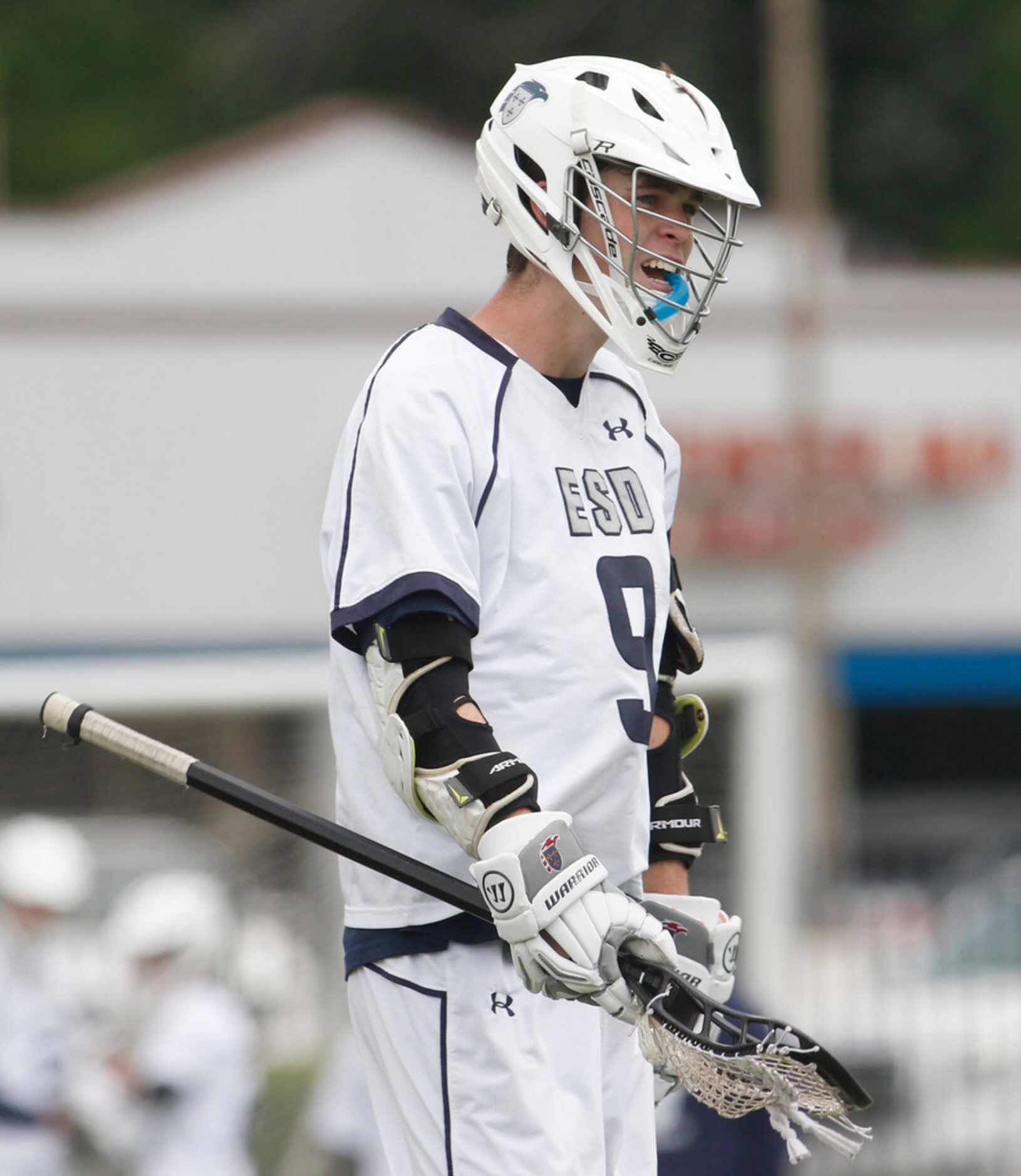 Episcopal School of Dallas attackman Drew Wasserman (9) lets out a yell after scoring a goal...