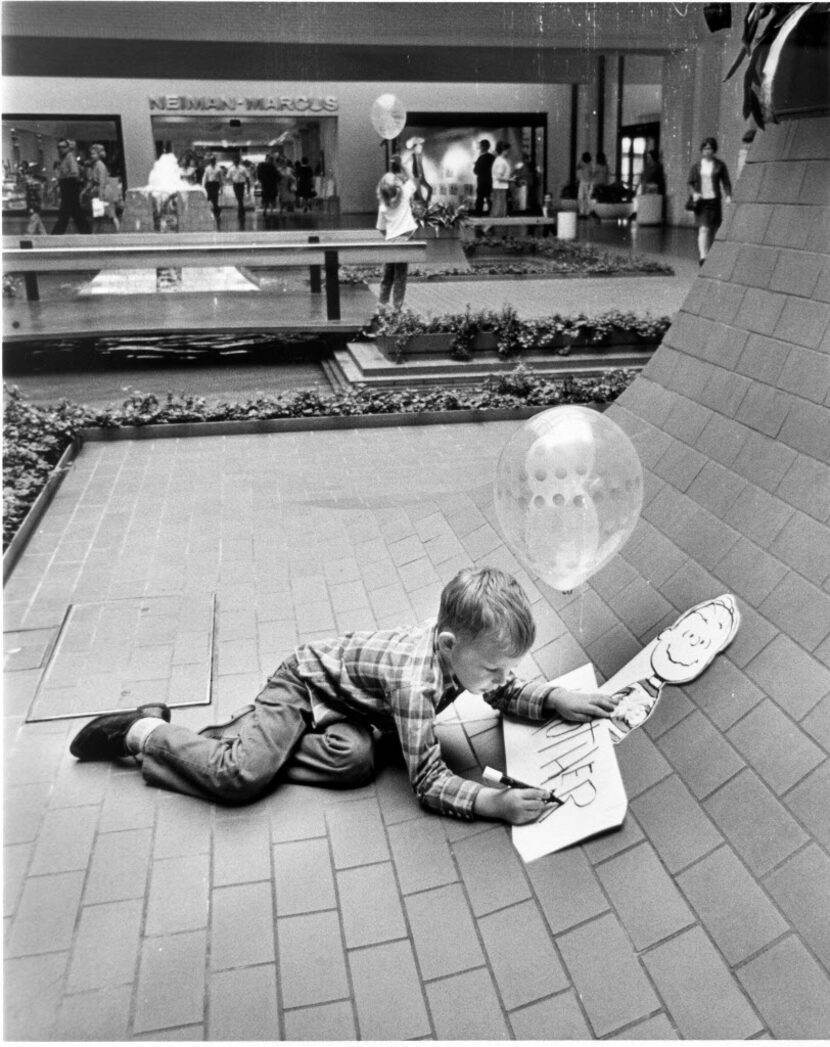 Children gravitated to the planter box in front of Neiman Marcus from day one at NorthPark...