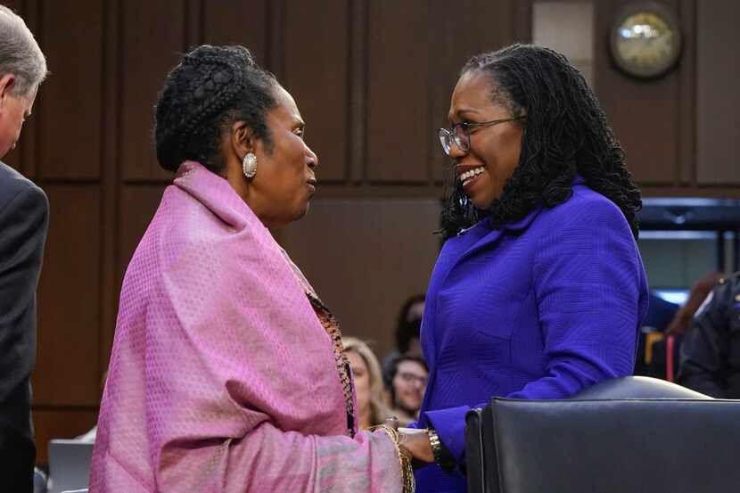 U.S. Rep. Sheila Jackson Lee, D-Texas,(left) talks to Ketanji Brown Jackson during a break...