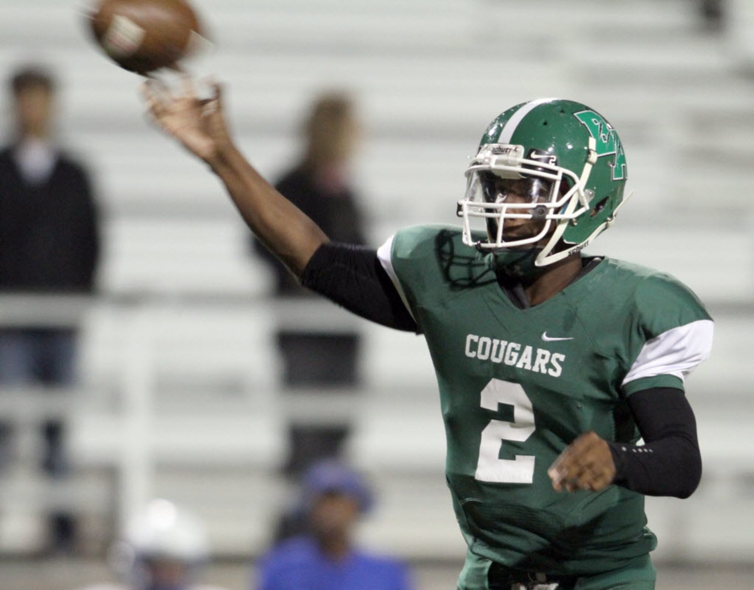 Bryan Adams quarterback XaiyViyon Mccuin (2) releases a pass over the middle for a second...